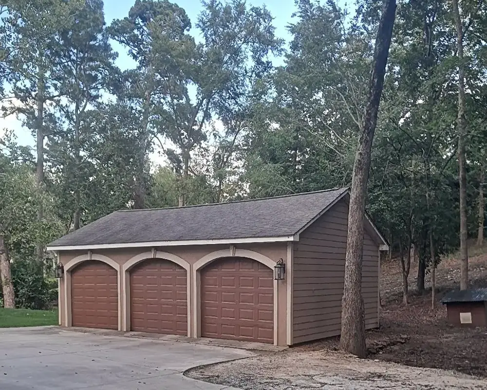 tree overhanging garage after